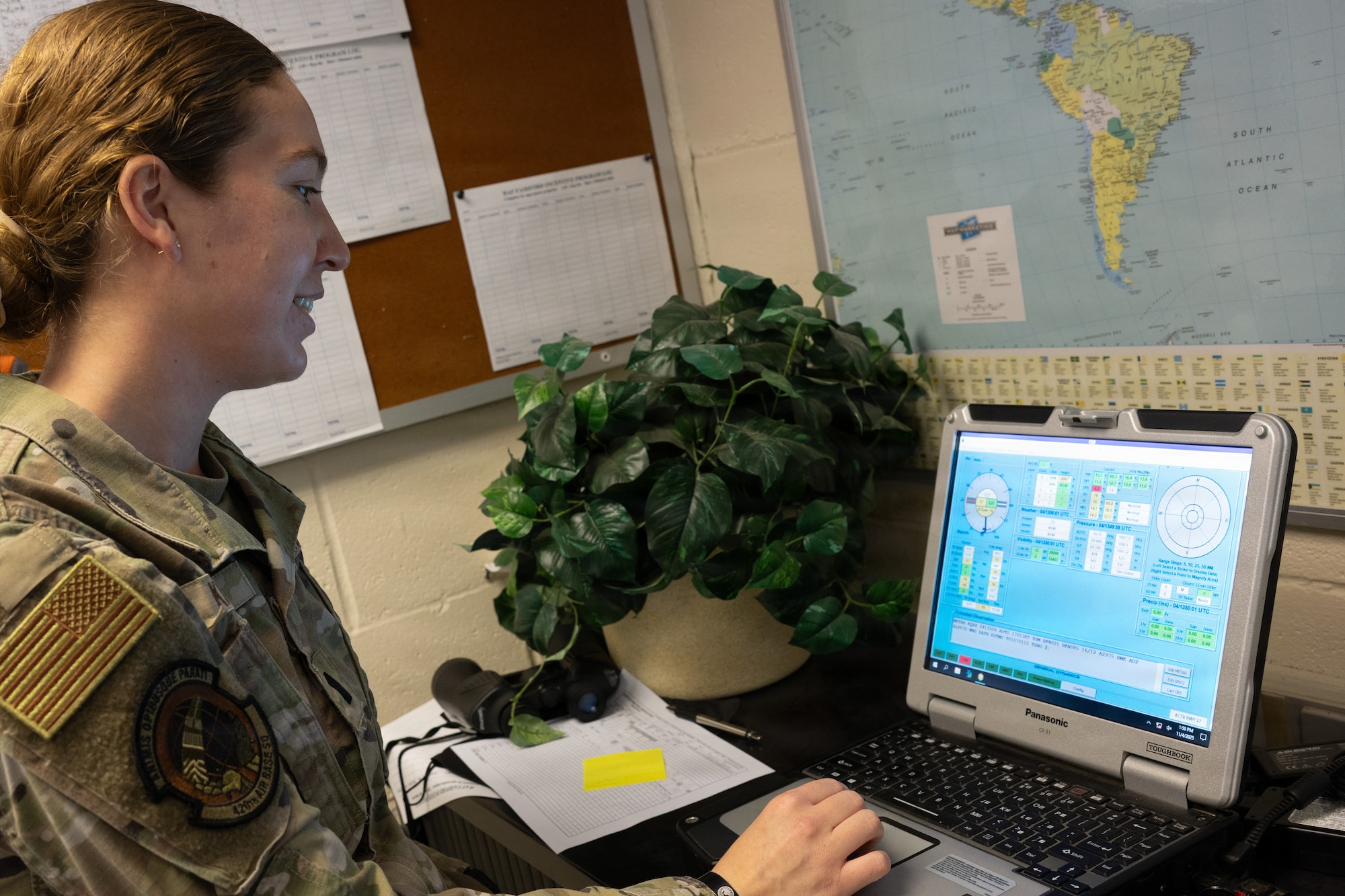 U.S. Air Force 1st Lt. Grace Kimzey, 420th Air Base Squadron Weather Flight Commander, monitors airfield data