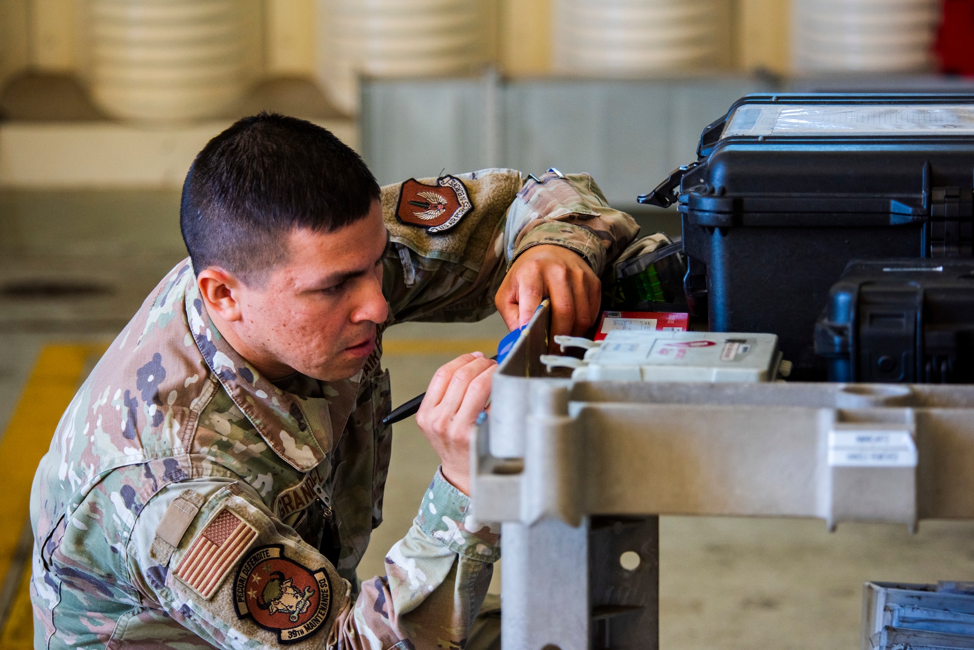 A service member documents data