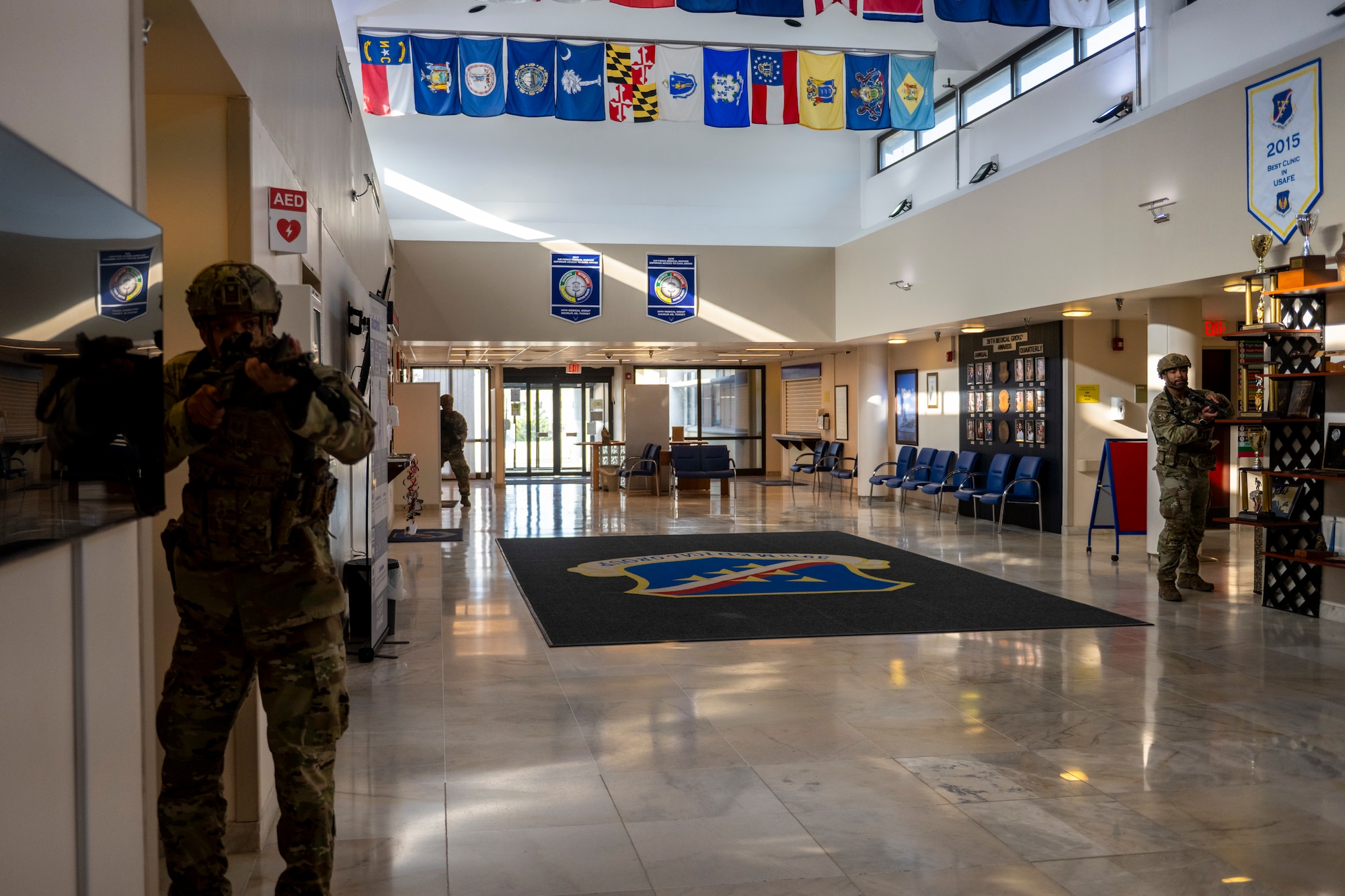 Service members take defensive positions