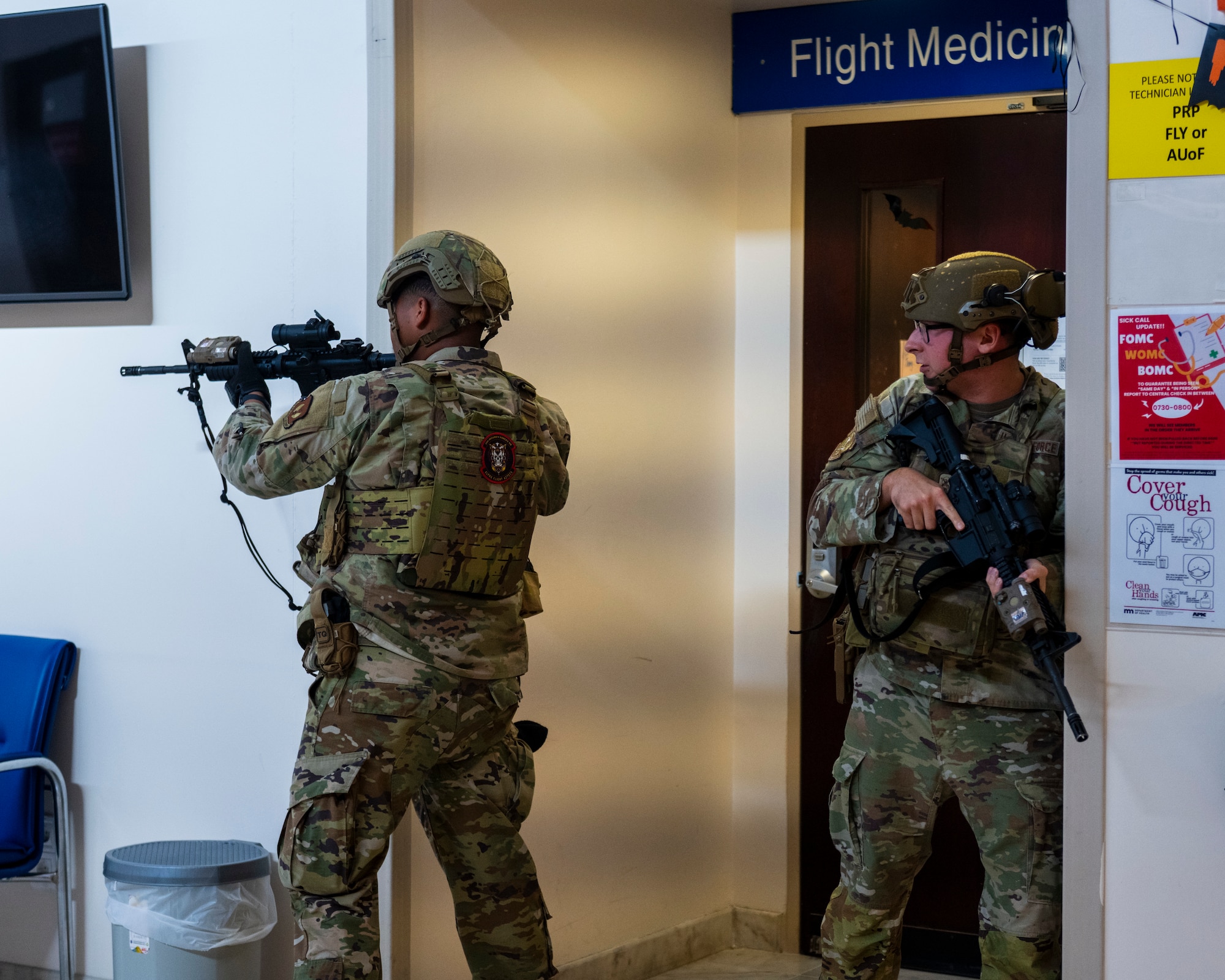 Service members secure a hallway
