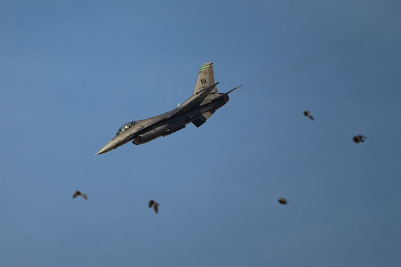 A U.S. Air Force F-16C Fighting Falcon assigned to the 555th Fighter Squadron in Aviano Air Base, Italy, performs aerial maneuvers Nov. 16, 2025, over Al Maktoum International Airport in Dubai, United Arab Emirates. The multi-role fighter aircraft rehearsed its performance prior to the Dubai Airshow 2025. (U.S. Air Force photo by Tech. Sgt. Justin Norton)