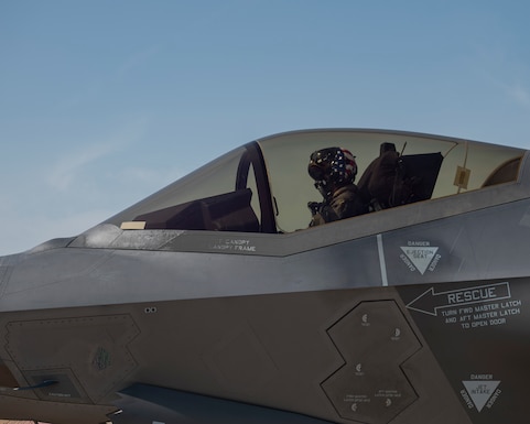 U.S. Air Force Maj. Melanie "Mach" Kluesner, the pilot assigned to the F-35A Lightning II Demonstration Team, conducts pre-flight checks before takeoff at Al Dhafra Air Base, United Arab Emirates, on Nov. 17, 2025. The team is performing at the Dubai Airshow to showcase the capabilities of the F-35A to nations around the globe. (U.S. Air Force photo by Staff Sgt. Nicholas Rupiper)