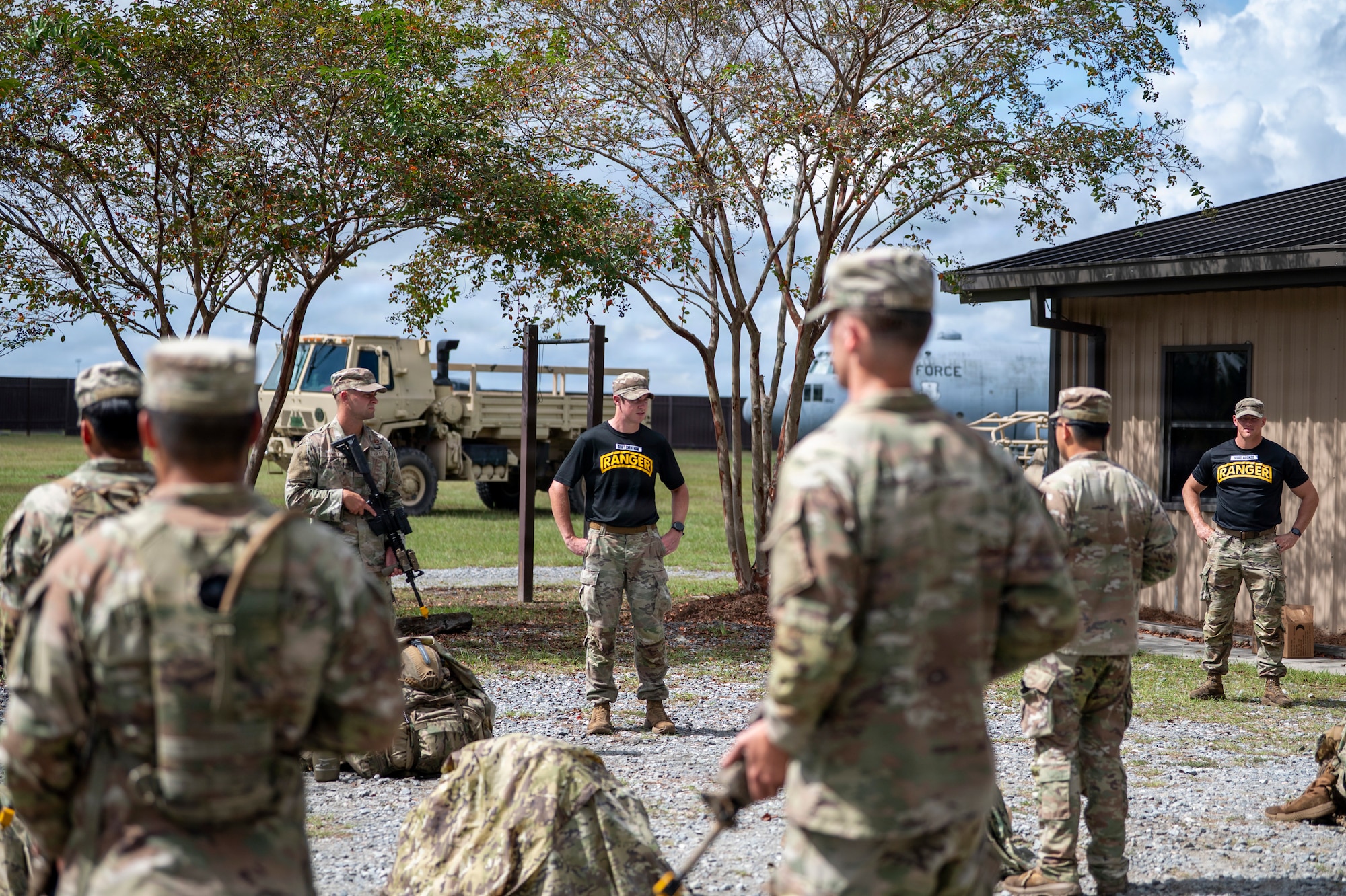 U.S. Air Force Airmen assigned to the 820th Base Defense Group receive a briefing from cadre during the Ranger Assessment and Preparation Course at Moody Air Force Base, Georgia, Oct. 7, 2025. The course, led by Ranger-qualified Airmen, prepares Defenders for the demanding physical and mental challenges of Army Ranger School. (U.S. Air Force photo by Senior Airman Leonid Soubbotine)