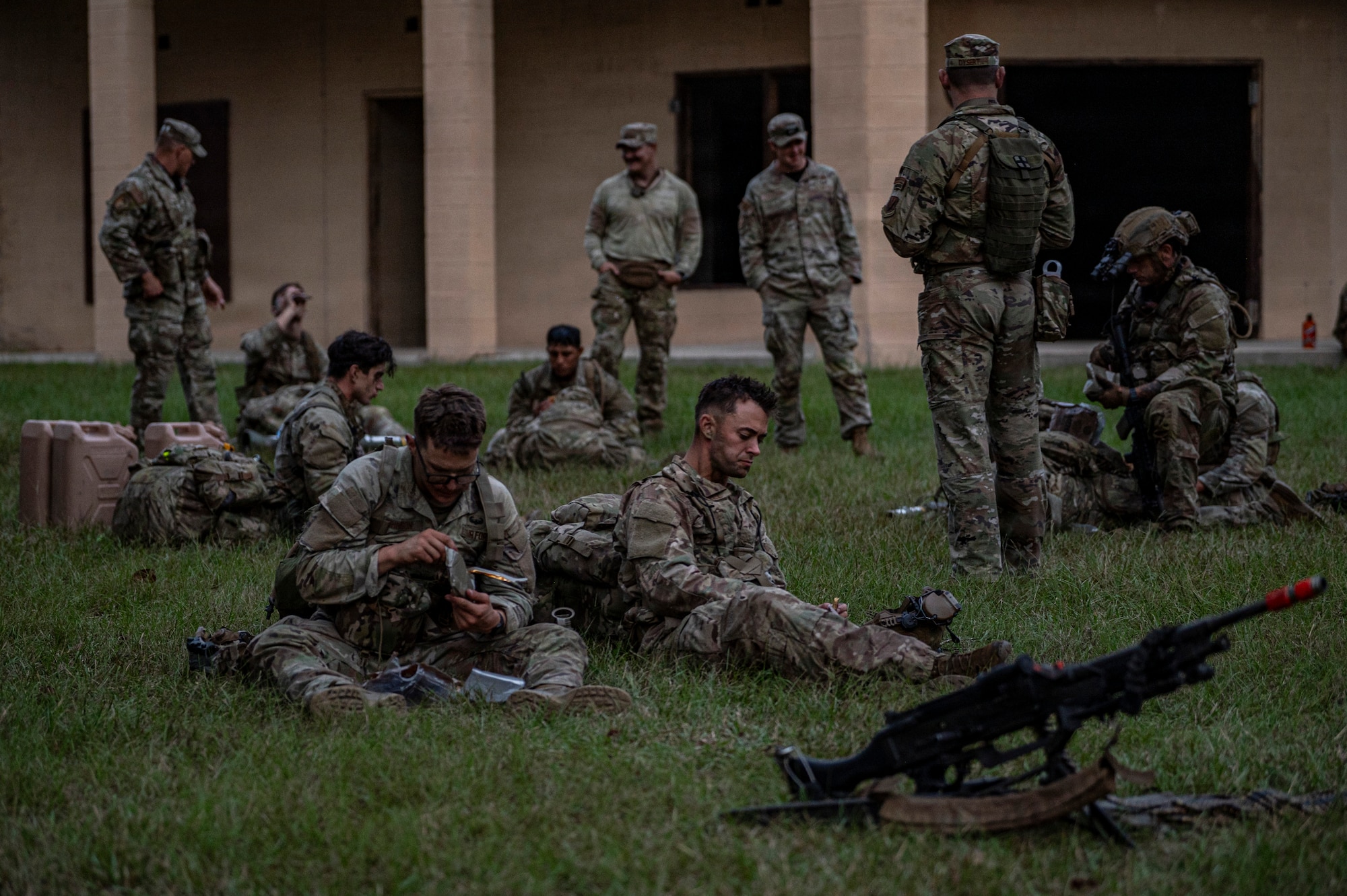 U.S. Air Force Airmen assigned to the 820th Base Defense Group eat and recover at Moody Air Force Base, Georgia, Oct. 10, 2025. The weeklong Ranger Assessment and Preparation Course pushed Defenders through land navigation, rucking and weapons drills, to getthem used the demands of Army Ranger School. (U.S. Air Force photo by Senior Airman Leonid Soubbotine)