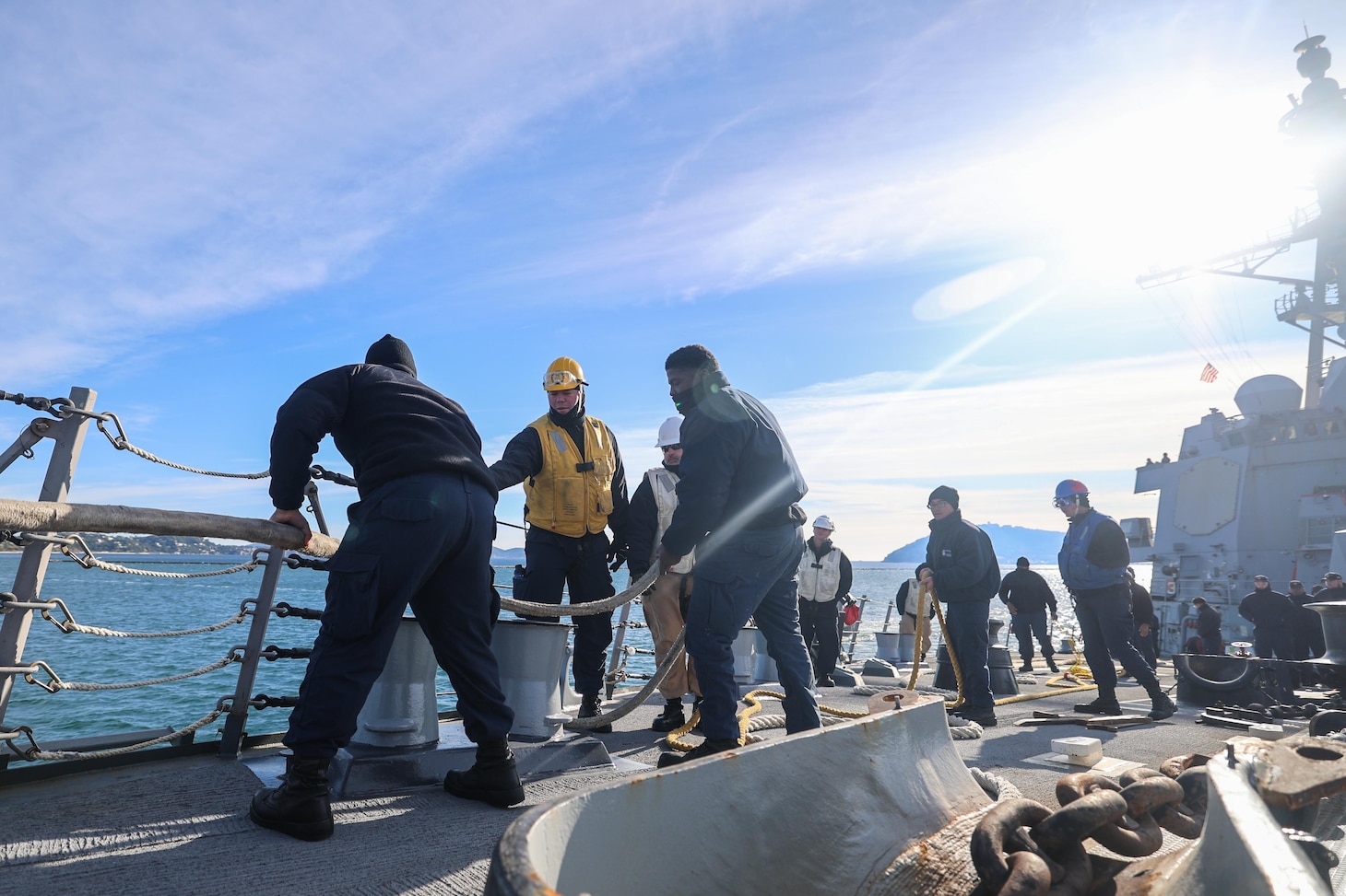 U.S. Navy Sailors assigned to Arleigh Burke-class guided-missile destroyer USS Paul Ignatius (DDG 117) heave a mooring line as the ship arrives in Toulon, France, Nov. 20, 2025.