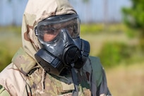 U..S. Air Force Airman 1st Class Daniel Garcia, 11th Security Forces Squadron, Joint Base Anacostia-Bolling, Washington, D.C., conducts a simulated combat patrol in Mission Oriented Protective Posture gear at Tyndall Air Force Base, Fla., Sept. 18, 2025.