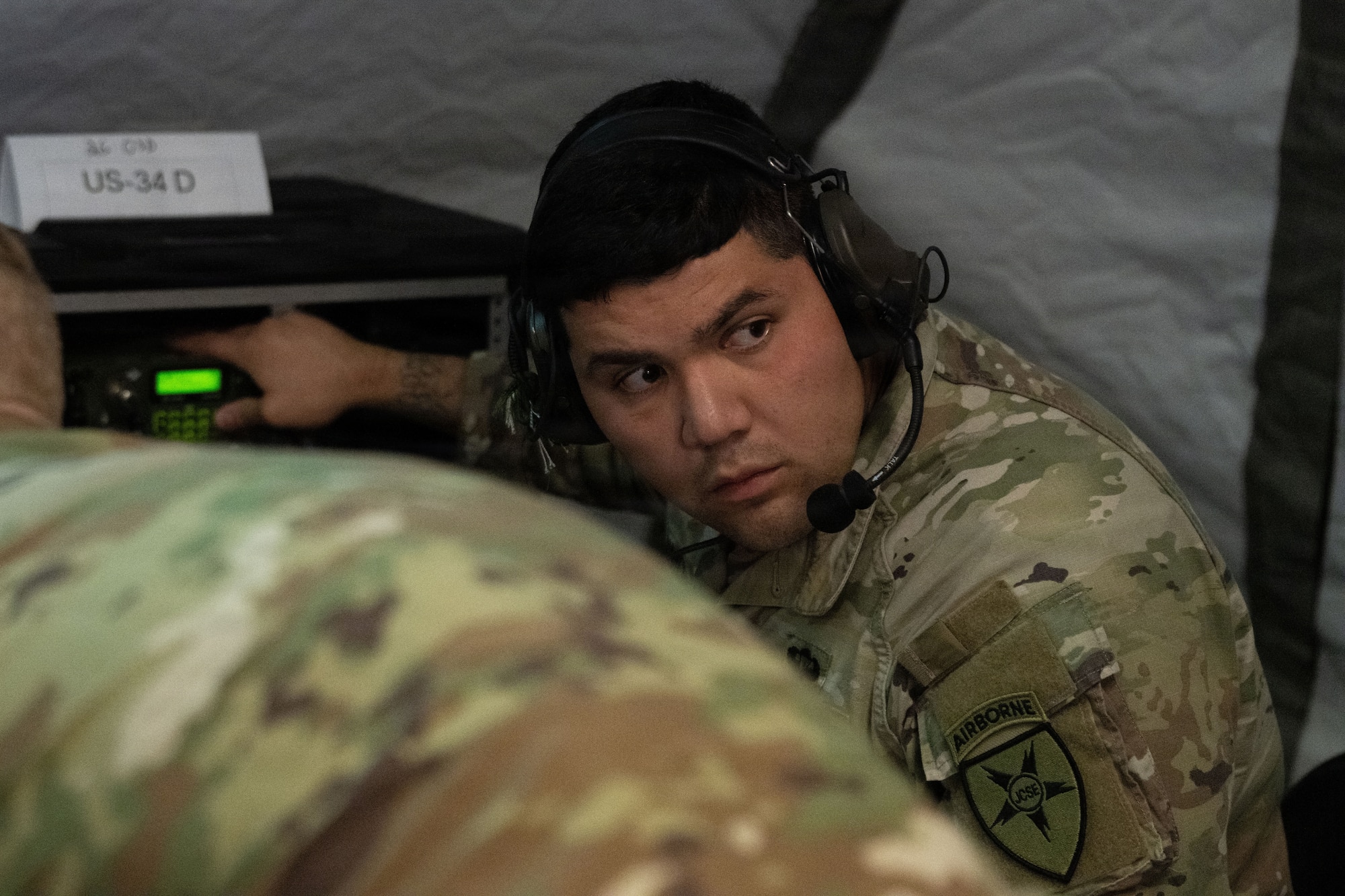 U.S. Army Sgt. Joedy Jimenez, a joint communicator assigned to the Joint Communications Support Element (JCSE), uses high-frequency radio technology for beyond line-of-site communication during Exercise Noble Skywave at MacDill Air Force Base, Florida, Oct. 22, 2025. Noble Skywave is an annual, Canadian-led high-frequency radio competition for military units to test and improve their ability to use high-frequency radio technology. JCSE competes to maintain high-frequency expertise and ability to operate in any environment. (U.S. Air Force photo by Airman Alexis Adams)