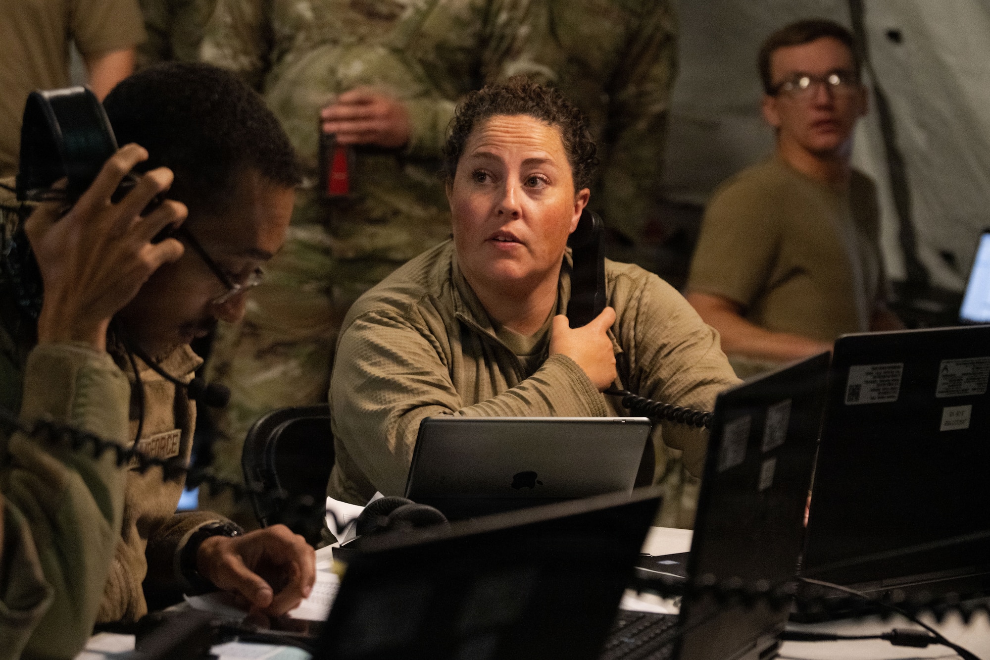 U.S. Army Sgt. Samantha Gauthier, a joint communicator assigned to the Joint Communications Support Element (JCSE), speaks on a phone using high-frequency radio technology during Exercise Noble Skywave at MacDill Air Force Base, Florida, Oct. 22, 2025. Noble Skywave is an annual, Canadian-led high-frequency radio competition for military units to test and improve their ability to use high-frequency radio technology. JCSE competes to maintain high-frequency expertise and ability to operate in any environment. (U.S. Air Force photo by Airman Alexis Adams)