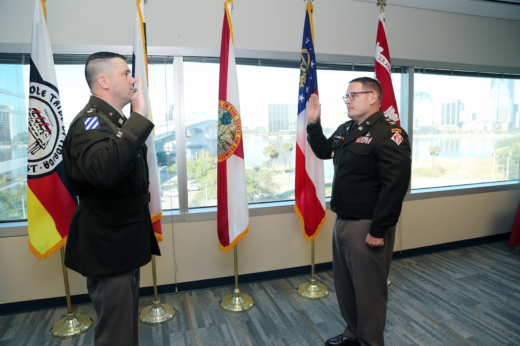Lt. Col. Matthew Westcott, U.S. Army Corps of Engineers Jacksonville District Deputy District, recites the oath of office administered by U. S. Army Col. Brandon Bowman, U.S. Army Corps of Engineers Jacksonville District Commander, during Westcott’s promotion ceremony at the Jacksonville District Headquarters, Nov. 13, 2025. The oath signifies the officer’s continued commitment to uphold and defend the Constitution of the United States. (U.S. Army photo by Mark Rankin).