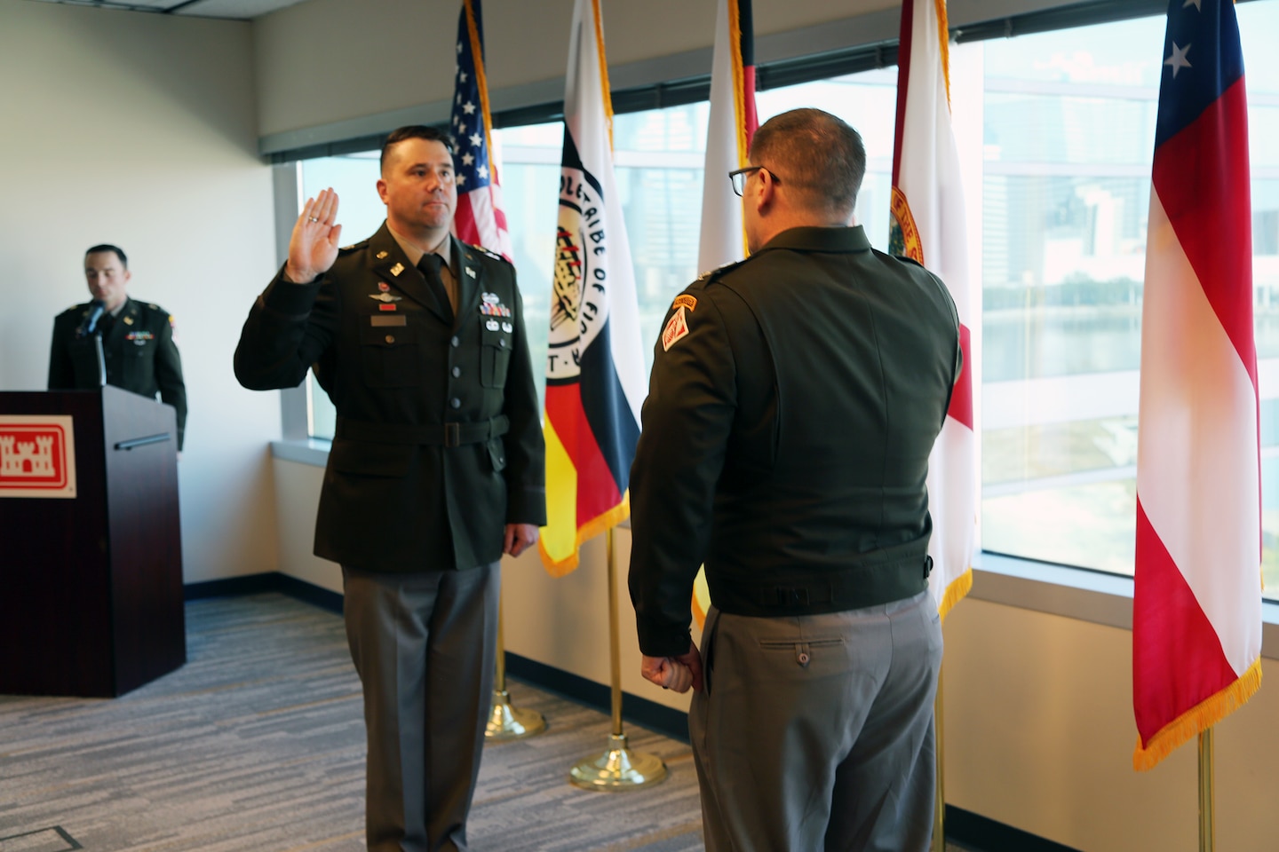 Lt. Col. Matthew Westcott, U.S. Army Corps of Engineers Jacksonville District Deputy District, recites the oath of office administered by U. S. Army Col. Brandon Bowman, U.S. Army Corps of Engineers Jacksonville District Commander, during Westcott’s promotion ceremony at the Jacksonville District Headquarters, Nov. 13, 2025. The oath signifies the officer’s continued commitment to uphold and defend the Constitution of the United States. (U.S. Army photo by Mark Rankin).
