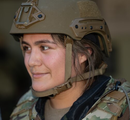 An Airman poses for a pictured during a combat related exercise.