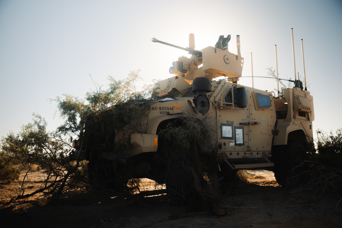 A U.S. Marine Corps Marine Air Defense Integrated System Mk1 assigned to 3rd Littoral Anti-Air Battalion, 3rd Marine Littoral Regiment, 3rd Marine Division, is staged to conduct point defense in support of counter-unmanned aerial system operations as part of Weapons and Tactics Instructor course 1-26 near Wellton, Arizona, Oct. 7, 2025. WTI is a seven-week training event hosted by Marine Aviation Weapons and Tactics Squadron One (MAWTS-1) which emphasizes operational integration of the six functions of Marine aviation in support of the Marine Air Ground Task Force, Joint and Coalition Forces. (U.S. Marine Corps photo by Cpl. Micah Thompson)