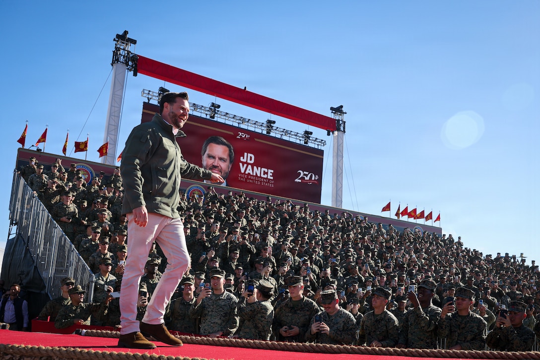 The Vice President of the United States, the Honorable JD Vance, walks to address U.S. Marines and Sailors during a Beach Bash event following the 250th Amphibious Capabilities Demonstration at Marine Corps Base Camp Pendleton, California, Oct. 18, 2025. The Beach Bash, held in conjunction with the Amphibious Capabilities Demonstration, celebrates Marines, Sailors, and the families and communities who sustain them. The event strengthens the bond between the Marine Corps and the Nation it serves, honoring 250 years of service and sacrifice. (U.S. Marine Corps photo by Cpl. Jacqueline Akamelu)