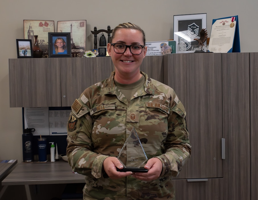 -  U.S. Air Force Master Sgt. Lyndi Bell, a contracting superintendent with the 151st Mission Support Group, arrived at Prince Sultan Air Base for her deployment in Saudi Arabia, facing overwhelming challenges. "I had not really been in a situation where I was having to lead a team before," said Bell. "Through all of that, our team rocked it and we did a lot of good things over there." 

Bell received the Excellence in Contracting and Agreements (ECA) 2025 NCO of the Year award, a recognition highly esteemed in the military contracting community. Her journey to this monumental moment began nearly two decades ago.