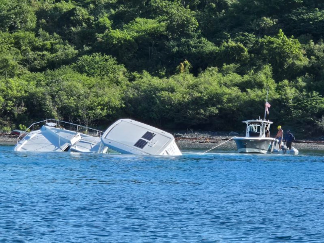 A Coast Guad Boat Force Unit U.S. Virgin Islands surface unit responds to the vessel Cool Change grounding in the vicinity of Christmas Cove, St. Thomas, U.S. Virgin Islands, Nov. 20, 2025.  Sector San Juan Incident Management Division personnel are coordinating with the responsible party/vessel representative, who is planning arrangements to contract a vessel salvor to address the pollution threat and vessel removal. (U.S. Coast Guard photo).