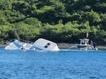 A Coast Guad Boat Force Unit U.S. Virgin Islands surface unit responds to the vessel Cool Change grounding in the vicinity of Christmas Cove, St. Thomas, U.S. Virgin Islands, Nov. 20, 2025.  Sector San Juan Incident Management Division personnel are coordinating with the responsible party/vessel representative, who is planning arrangements to contract a vessel salvor to address the pollution threat and vessel removal. (U.S. Coast Guard photo).