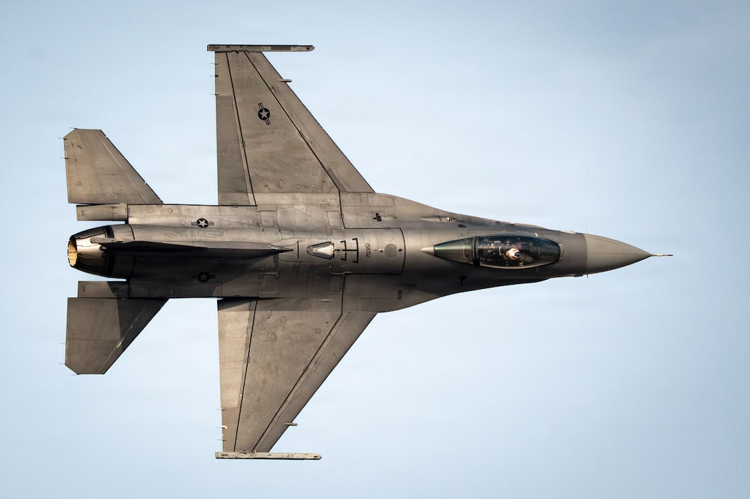 U.S. Air Force Maj. Taylor “FEMA” Hiester, F-16 Viper Demonstration Team commander and pilot, performs aerial maneuvers in a U.S. Air Force F-16C Fighting Falcon assigned to the 31st Fighter Wing at Aviano Air Base, Italy, during an airshow at Dubai, United Arab Emirates, Nov. 16, 2025. The F-16 is a multi-role fighter aircraft capable of air-to-air and air-to-ground combat. (U.S. Air Force photo by Staff Sgt. Steven Cardo)