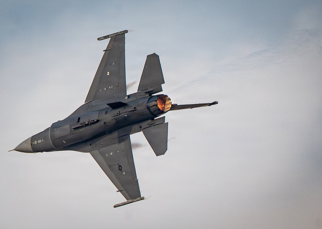 U.S. Air Force Maj. Taylor “FEMA” Hiester, F-16 Viper Demonstration Team commander and pilot, performs aerial maneuvers in a U.S. Air Force F-16C Fighting Falcon assigned to the 31st Fighter Wing at Aviano Air Base, Italy, during an airshow at Dubai, United Arab Emirates, Nov. 16, 2025. The F-16 is a multi-role fighter aircraft capable of air-to-air and air-to-ground combat. (U.S. Air Force photo by Staff Sgt. Steven Cardo)