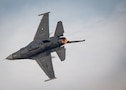 U.S. Air Force Maj. Taylor “FEMA” Hiester, F-16 Viper Demonstration Team commander and pilot, performs aerial maneuvers in a U.S. Air Force F-16C Fighting Falcon assigned to the 31st Fighter Wing at Aviano Air Base, Italy, during an airshow at Dubai, United Arab Emirates, Nov. 16, 2025. The F-16 is a multi-role fighter aircraft capable of air-to-air and air-to-ground combat. (U.S. Air Force photo by Staff Sgt. Steven Cardo)