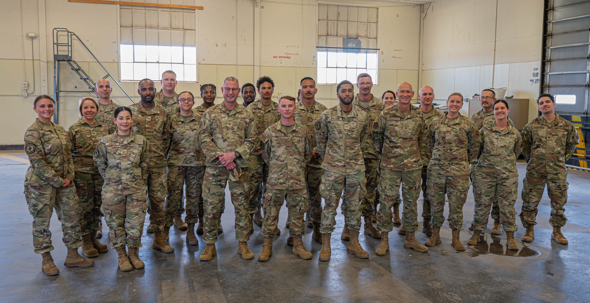 Col Justin Secrest, 377th Air Base Wing commander, and Chief Master Sgt. Andrew Rapsavage, 377 ABW command chief, recognized outstanding performers from the 377th Logistics Readiness Squadron for their work during the Nuclear Surety Staff Assistance Visit at Kirtland Air Force Base, New Mexico, Sept. 30, 2025. Secrest presented the Command Safety Directorate coin to Senior Airman Dillon Rosenberg and SrA Jacob Tucker for their exceptional professionalism during the visit. (U.S. Air Force photo by Airman Alenne Mojica)