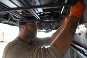 U.S. Air Force Staff Sgt. Charles Stevenson, 357th Fighter Generation Squadron weapons load team chief, performs phase maintenance onunder an A-10C Thunderbolt II aircraft at Davis-Monthan Air Force Base, October 20, 2025. Phase maintenance occurs when an A-10 aircraft hits 600 flying hours. (U.S. Air Force photo by Airman 1st Class Jaden Kidd)
