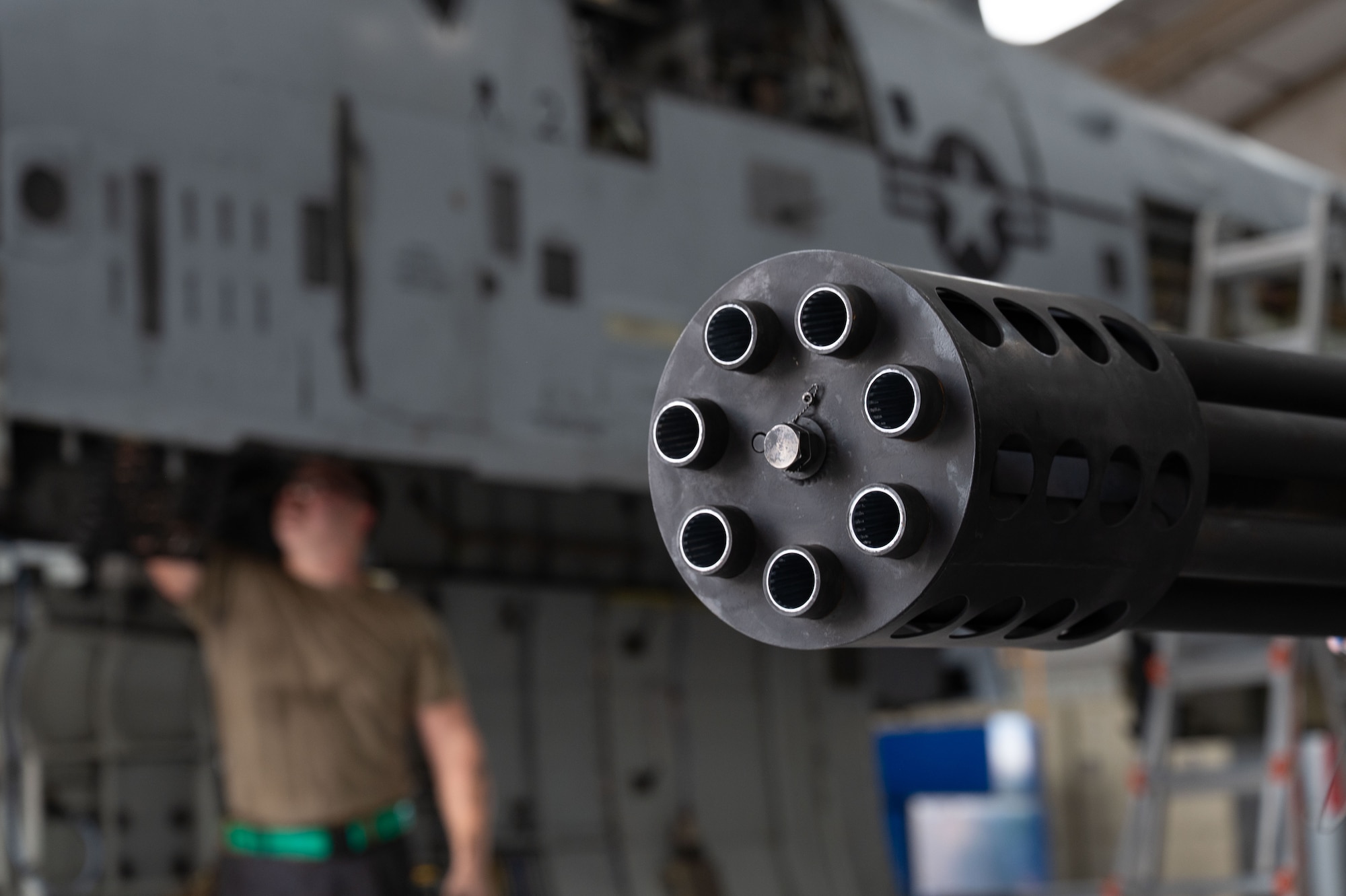 U.S. Air Force Airmen successfully remove the GAU-8 Avenger Gatling Gun from an A-10C Thunderbolt II aircraft during phase maintenance at Davis-Monthan Air Force Base, October 23, 2025. Phase maintenance is a process where the entire aircraft is taken apart, inspected, repaired and put back together to keep the aircraft operational. (U.S. Air Force photo by Airman 1st Class Jaden Kidd)