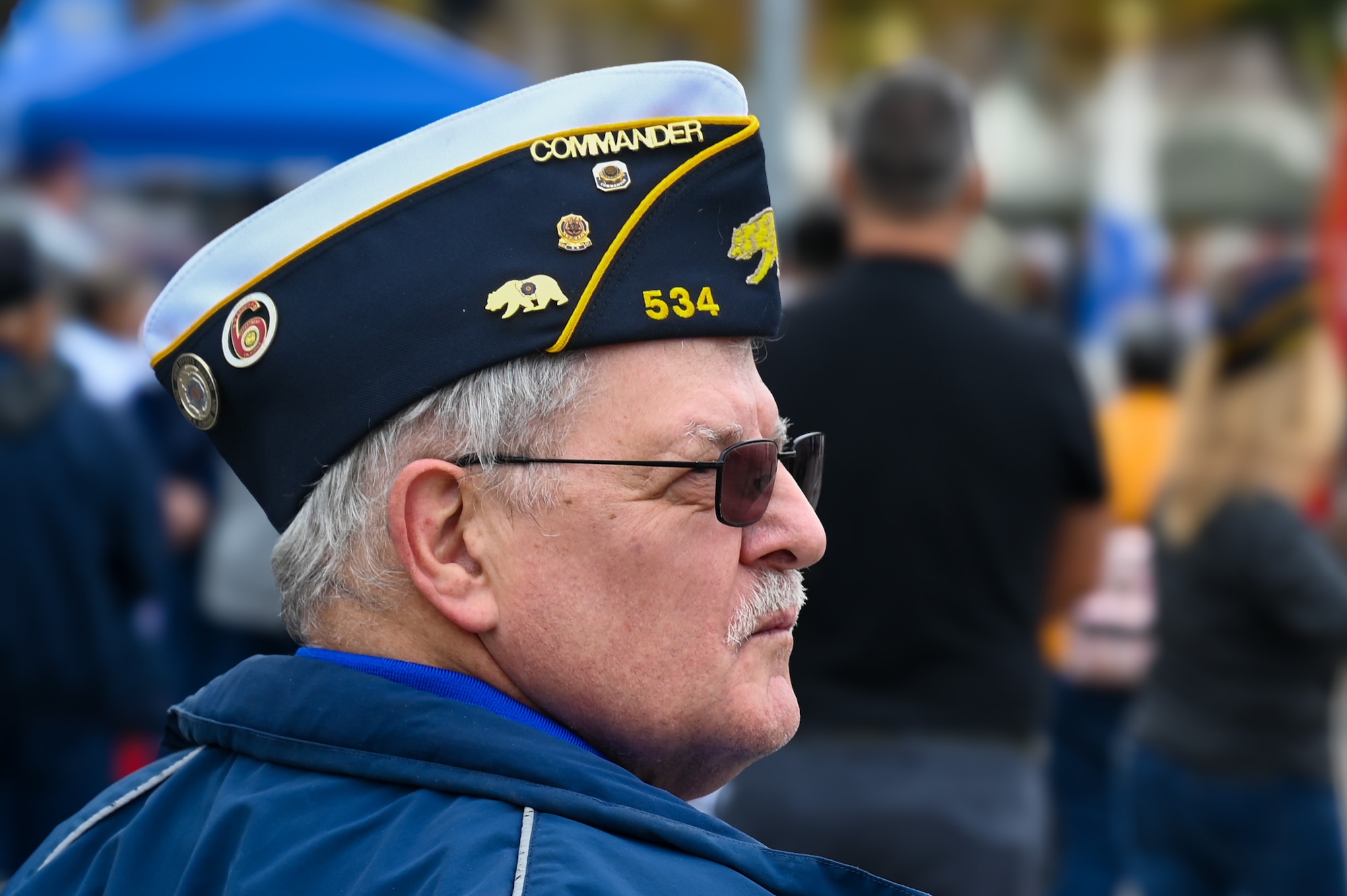 A U.S. military veteran looks into the distance.