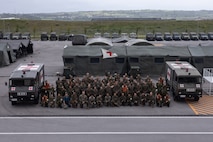 U.S. Marines, Sailors and Japanese Ground Self-Defense Force members pose for a photo during exercise 07JX on Ishigaki, Okinawa, Japan, Oct 25, 2025. 07JX is a bilateral exercise that aims to enhance bilateral Japan-U.S. capabilities for humanitarian assistance and disaster relief operations in the Southwest islands. (U.S. Marine Corps photo by Lance Cpl. Marcus Henson)