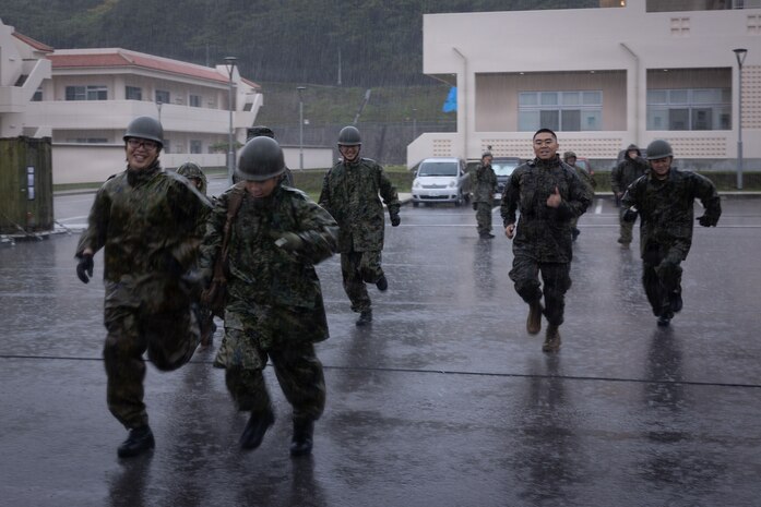 U.S. Navy Sailors and Japanese Ground Self-Defense Force members participate in a medical skills relay competition during exercise 07JX on Ishigaki, Okinawa, Japan, Oct 25, 2025. 07JX is a bilateral exercise that aims to enhance bilateral Japan-U.S. capabilities for humanitarian assistance and disaster relief operations in the Southwest islands. (U.S. Marine Corps photo by Lance Cpl. Marcus Henson)
