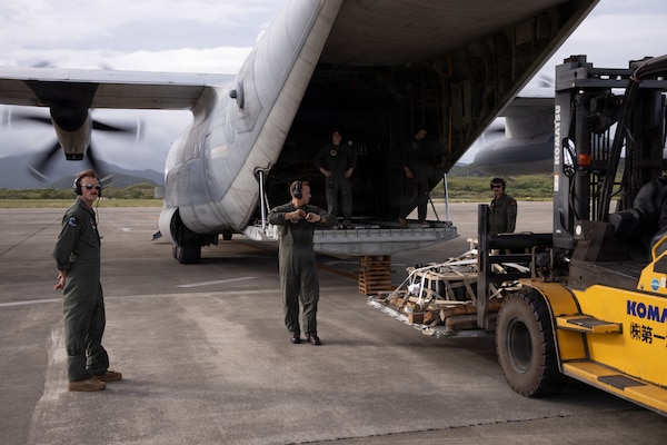 U.S. Marines with Marine Aerial Refueler Transport Squadron 152, Marine Aircraft Group 12, 1st Marine Aircraft Wing, offload medical supplies from a KC-130J as a part of exercise 07JX on Ishigaki, Okinawa, Japan, Oct. 25, 2025. 07JX is a bilateral exercise that aims to enhance bilateral Japan-U.S. capabilities for humanitarian assistance and disaster relief operations in the Southwest islands. (U.S. Marine Corps photo by Lance Cpl. Marcus Henson)