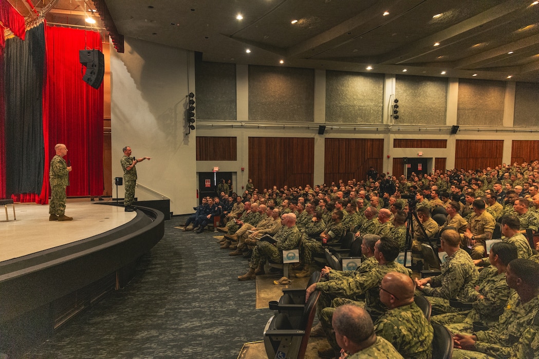 Chief of Naval Operations Adm. Daryl Caudle, left, and Master Chief Petty Officer of the Navy John Perryman, host an all-hands call with Sailors at Naval Base Guam theater, Nov. 19.