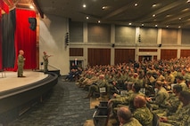 Chief of Naval Operations Adm. Daryl Caudle, left, and Master Chief Petty Officer of the Navy John Perryman, host an all-hands call with Sailors at Naval Base Guam theater, Nov. 19.