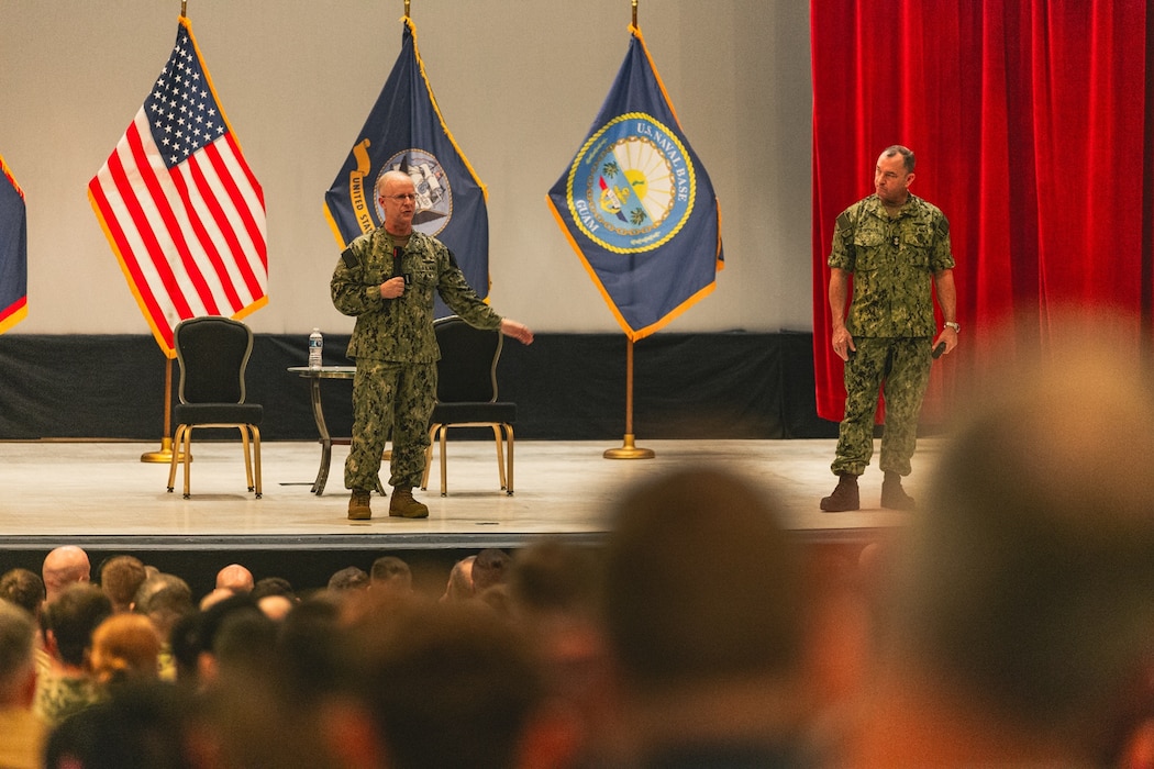 Chief of Naval Operations Adm. Daryl Caudle, left, and Master Chief Petty Officer of the Navy John Perryman, host an all-hands call with Sailors at Naval Base Guam theater, Nov. 19.