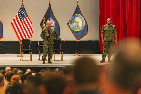 Chief of Naval Operations Adm. Daryl Caudle, left, and Master Chief Petty Officer of the Navy John Perryman, host an all-hands call with Sailors at Naval Base Guam theater, Nov. 19.
