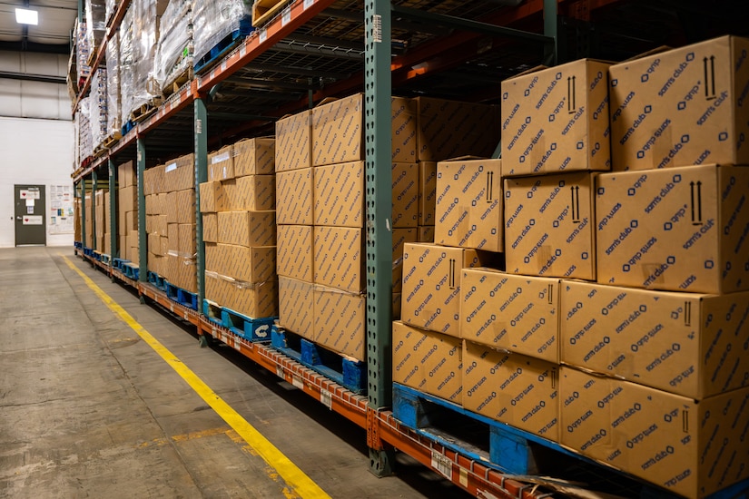 Airmen and Soldiers from the Kentucky National Guard pack hundreds of boxes with free food staples at the Dare to Care Food Bank in Louisville, Ky., Nov. 13, 2025. The boxes, containing canned fruit and vegetables, peanut butter, pasta and other nutritious foods, will be given to Kentuckians who are struggling to purchase basic groceries. (U.S. Air National Guard photos by Dale Greer)