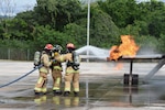U.S. service members and partner nation firefighters conduct aircraft live fire training during exercise CENTAM SMOKE at Soto Cano Air Base, Honduras, Nov. 4, 2025. The purpose of CENTAM SMOKE is to increase Joint Task Force-Bravo’s crisis response readiness and validate partner nation emergency response capabilities through fire and emergency preparedness events. (U.S. Air Force courtesy photo by Staff Sgt. Alexandra Berumen)