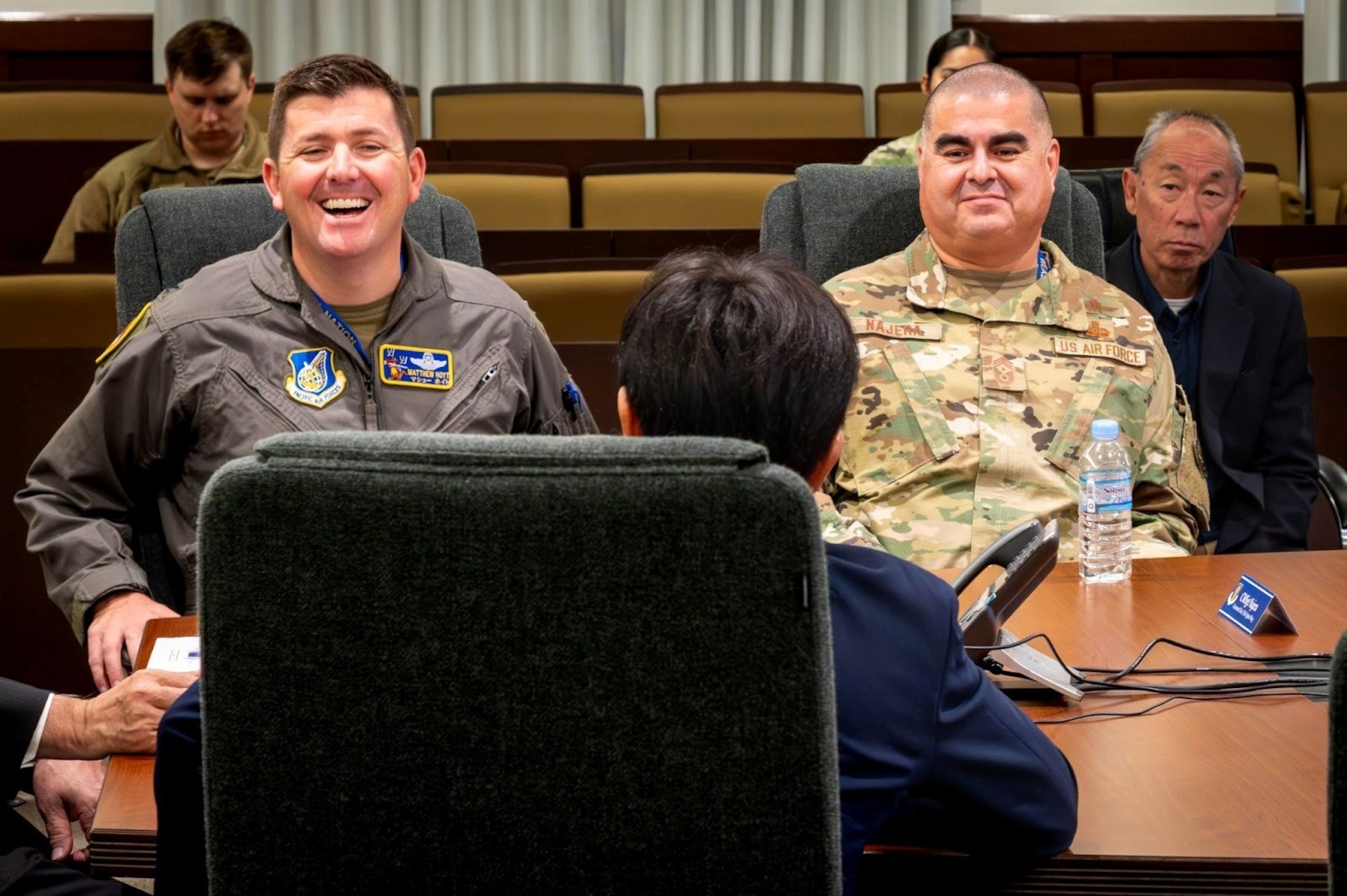 U.S. Air Force Col. Matthew Hoyt, left, 35th Fighter Wing (FW) deputy commander, and Chief Master Sgt. David Najera, 35th FW command chief, attend a meeting at Misawa Air Base, Japan, Nov. 5, 2025.