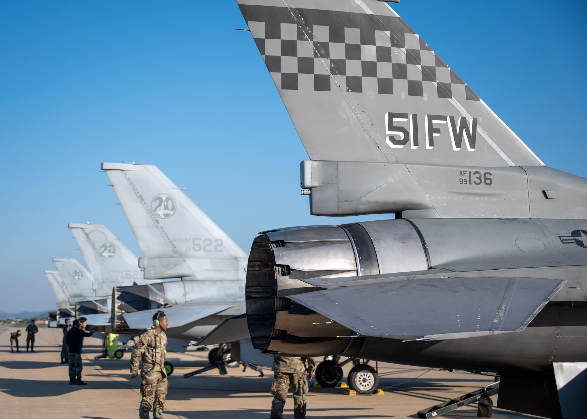 F-16 Fighting Falcons sit on the flightline before a U.S.-Republic of Korea Combined Command Flight at Osan Air Base, ROK, Nov. 3, 2025. The Chairman of Joint Chiefs of Staff and other senior leaders arrived to participate in the Security Consultative Meeting and the Military Cooperation Meeting, highlighting the enduring strength of the U.S.-ROK Alliance. (U.S. Air Force photo by Staff Sgt. Sarah Williams)