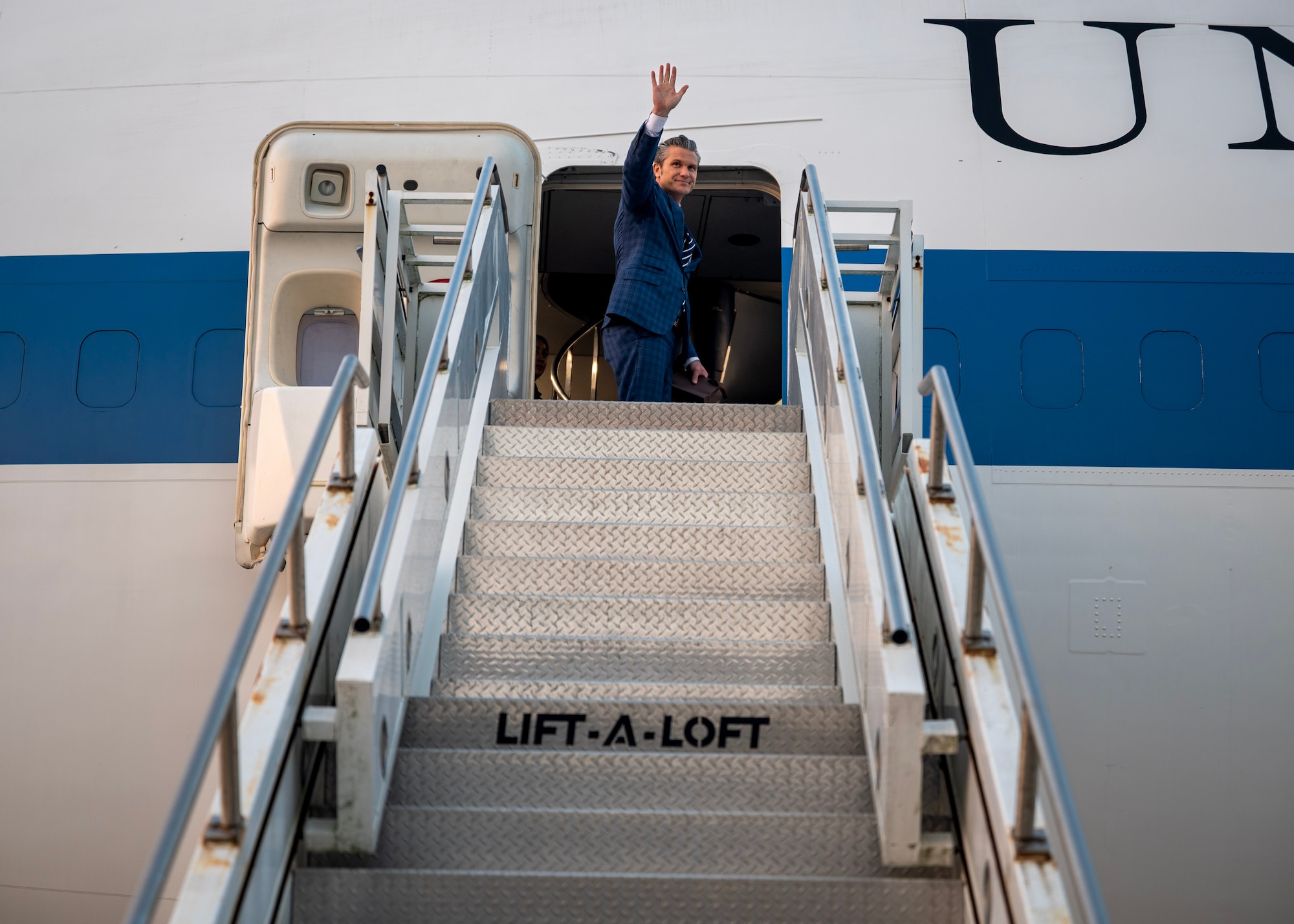 Secretary of War Pete Hegseth waves goodbye at Osan Air Base, Republic of Korea, Nov. 4, 2025. Hegseth and other senior leaders arrived to participate in the Security Consultative Meeting and the Military Cooperation Meeting, highlighting the enduring strength of the U.S.-ROK Alliance. (U.S. Air Force photo by Staff Sgt. Sarah Williams)