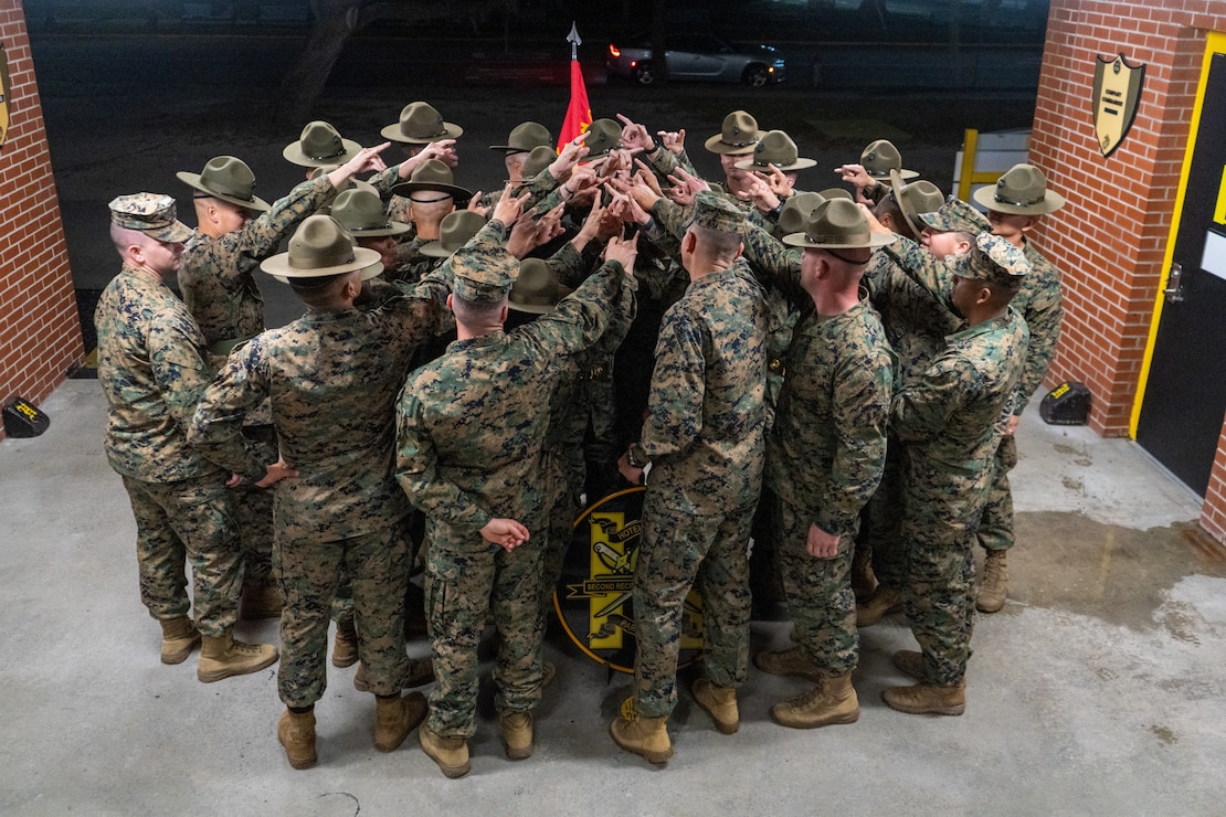 U.S. Marine Corps Sgt. Maj. Carlos A. Ruiz, the 20th Sergeant Major of the Marine Corps, speaks to drill instructors with Hotel Company, 2nd Recruit Training Battalion, at Marine Corps Recruit Depot Parris Island, South Carolina, Nov. 10, 2025. During his two-day visit to the depot, Ruiz met with senior enlisted leaders and drill instructors to discuss training standards and observe daily operations. (U.S. Marine Corps photo by Master Sgt. Kassie McDole)