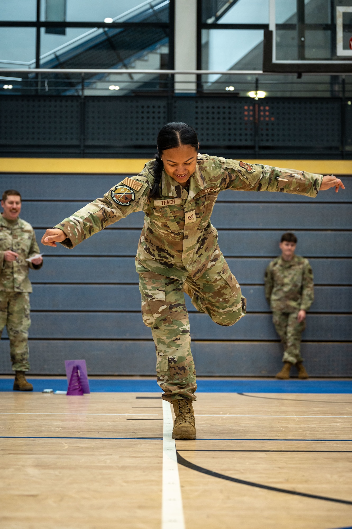 U.S. Air Force Capt. Westley Vicente, 86th Medical Group mental health element chief, does a vertical jump test during the October PT Month Health Fair at Ramstein Air Base, Germany, Oct. 17, 2025.