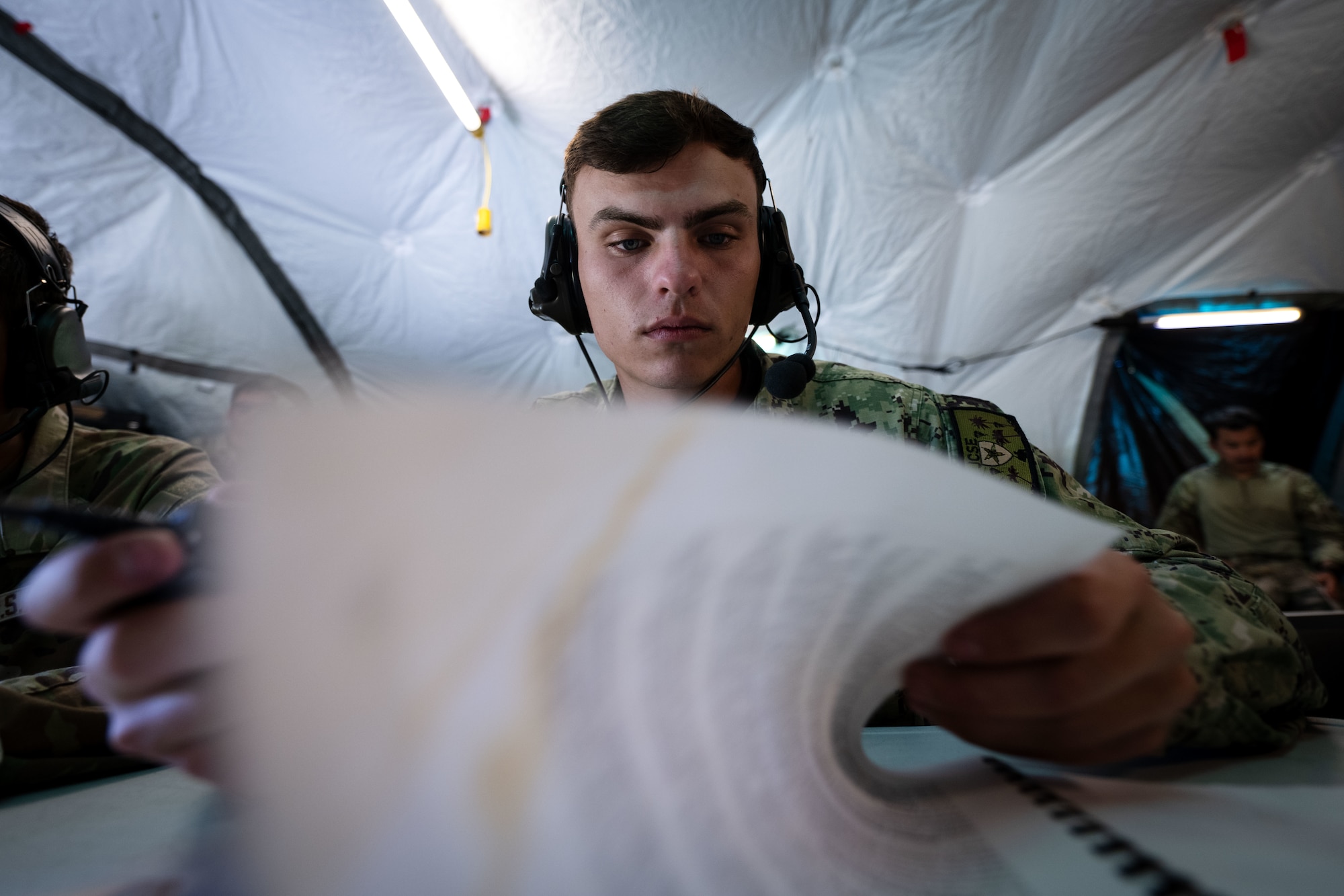 U.S. Navy Petty Officer 2nd Class Adam Inderbitzen, 2nd Joint Communication Squadron information systems technician, prepares for Exercise Noble Skywave at MacDill Air Force Base, Florida, Oct. 16, 2025. Noble Skywave is an annual, Canadian-led high-frequency radio competition for military units to test and improve their ability to use high-frequency radio technology. JCSE competes to maintain high-frequency expertise and the ability to operate in any environment. (U.S. Air Force photo by Senior Airman Zachary Foster)
