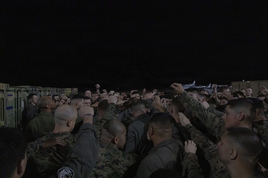 U.S. Marines with Marine Fighter Attack Squadron (VMFA) 225, U.S. Marine Corps Forces, South, conduct a unit chant at Jose Aponte de la Torre Airport in Ceiba, Puerto Rico, Nov. 11, 2025. U.S. military forces are deployed to the Caribbean in support of the U.S. Southern Command mission, Department of War-directed operations, and the president’s priorities to disrupt illicit drug trafficking and protect the homeland. (U.S. Marine Corps photo)