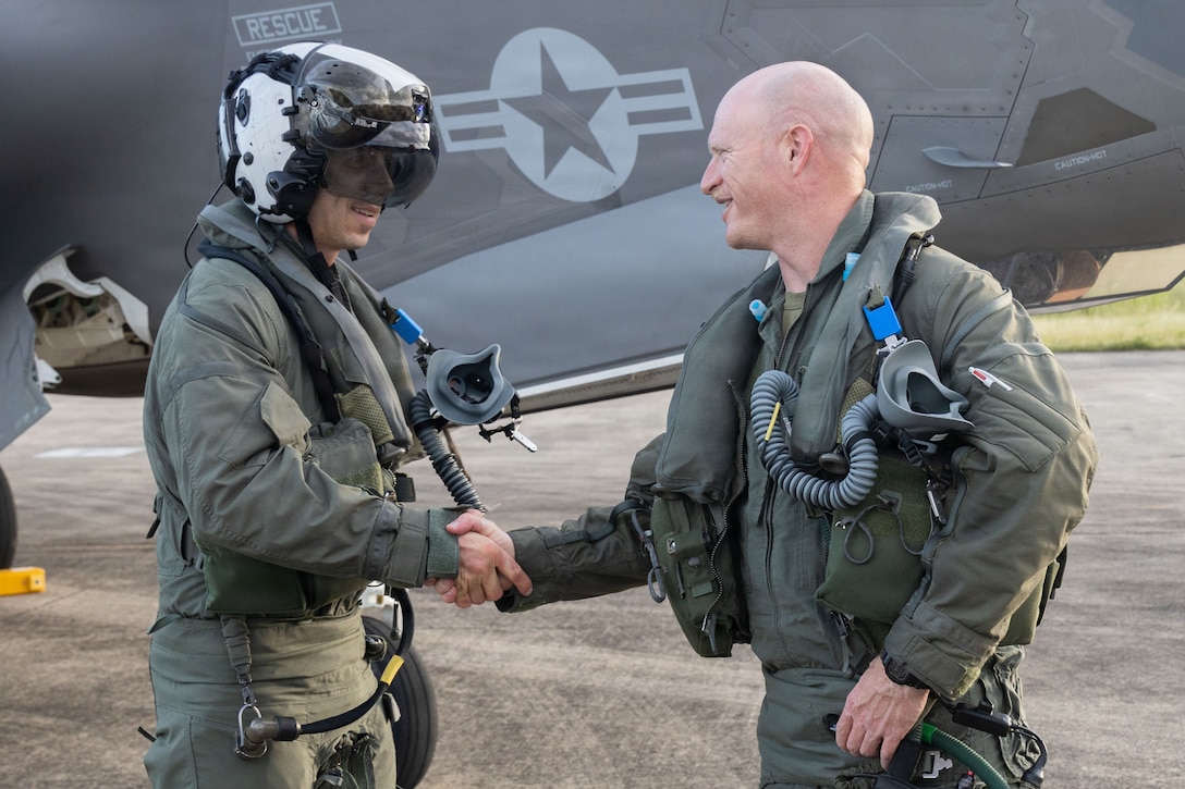 U.S. Marine Corps Col. Alexander E. Goodno, left, commanding officer of Marine Aircraft Group 13, 3rd Marine Aircraft Wing, and the commanding officer of Marine Fighter Attack Squadron (VMFA) 225, U.S. Marine Corps Forces, South, right, shake hands after flying together in U.S. Marine Corps F-35B Lightning II aircraft assigned to VMFA-225 at Jose Aponte de la Torre Airport in Ceiba, Puerto Rico, Nov. 11, 2025. U.S. military forces are deployed to the Caribbean in support of the U.S. Southern Command mission, Department of War-directed operations, and the president’s priorities to disrupt illicit drug trafficking and protect the homeland. (U.S. Marine Corps photo)