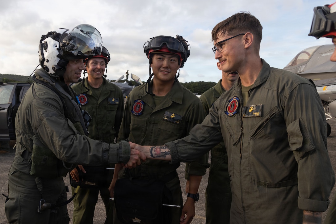 U.S. Marine Corps Col. Alexander E. Goodno, commanding officer of Marine Aircraft Group 13, 3rd Marine Aircraft Wing thanks maintainers with Marine Fighter Attack Squadron (VMFA) 225, U.S. Marine Corps Forces, South, after flying in a U.S. Marine Corps F-35B Lightning II assigned to VMFA-225 at Jose Aponte de la Torre Airport in Ceiba, Puerto Rico, Nov. 11, 2025. U.S. military forces are deployed to the Caribbean in support of the U.S. Southern Command mission, Department of War-directed operations, and the president’s priorities to disrupt illicit drug trafficking and protect the homeland. (U.S. Marine Corps photo)