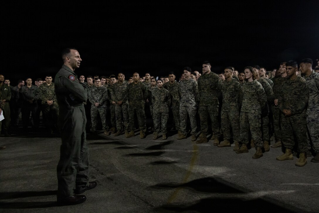 U.S. Marine Corps Col. Alexander E. Goodno, 3rd Marine Aircraft Wing, commanding officer of Marine Aircraft Group 13, speaks to Marines with Marine Fighter Attack Squadron (VMFA) 225, U.S. Marine Corps Forces, South, at Jose Aponte de la Torre Airport in Ceiba, Puerto Rico, Nov. 11, 2025. U.S. military forces are deployed to the Caribbean in support of the U.S. Southern Command mission, Department of War-directed operations, and the president’s priorities to disrupt illicit drug trafficking and protect the homeland. (U.S. Marine Corps photo)