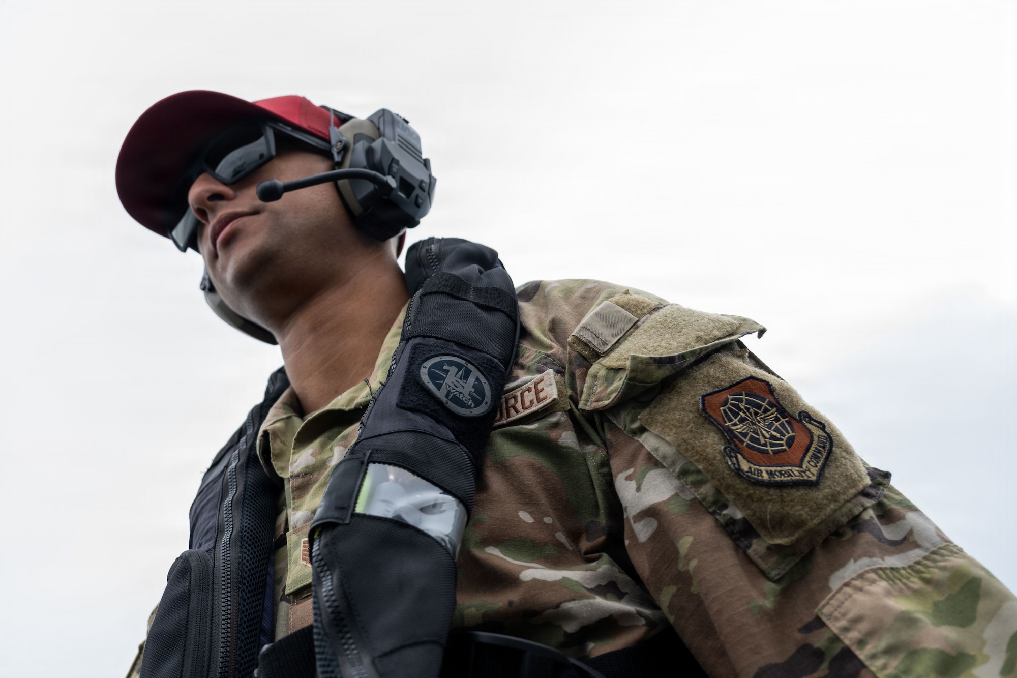 U.S. Air Force Tech. Sgt. Hunter Sterling, 6th Security Forces Squadron combat arms training and maintenance (CATM) section chief, prepares to assist a 6th SFS marine patrolman in annual M240B machine gun training at MacDill Air Force Base, Florida, Nov. 6, 2025. CATM instructors ensure safety while helping improve a shooter's accuracy and confidence in the weapon. (U.S. Air Force photo by Airman Alexis Adams)