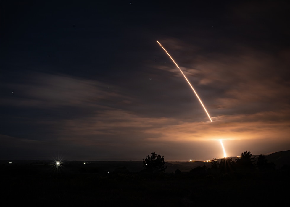 Missile taking off at night