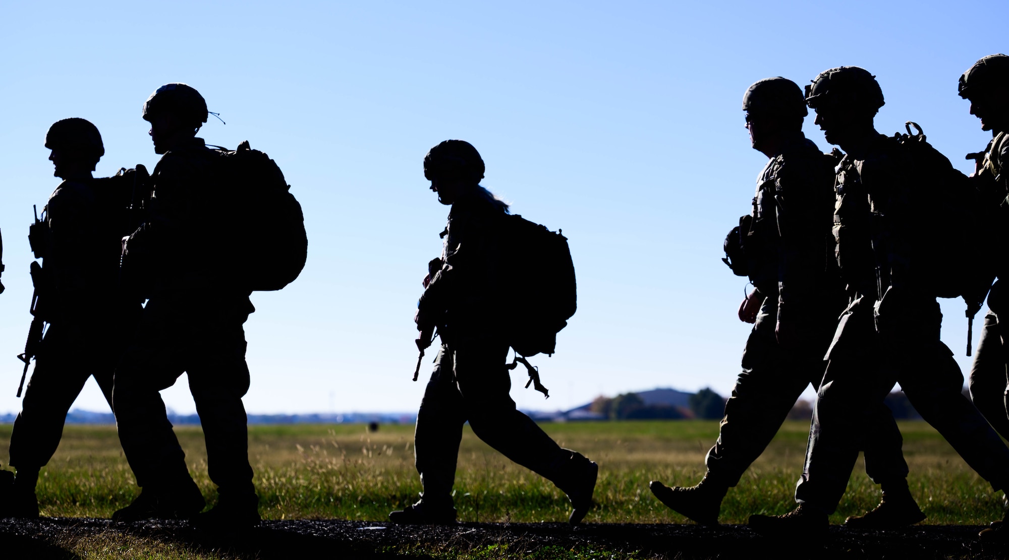Airmen ruck across base.