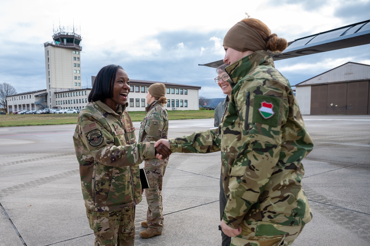 U.S. Air Force Col. Michelle Wyche, 86th Aeromedical Evacuation Squadron commander, thanks Hungarian Armed Forces Lt. Eva Damasdi, NATO Centre of Excellence for Military Medicine Medical Evaluation Course director, for her work in setting up a mock evaluation at Ramstein Air Base, Germany, Nov. 20, 2025.